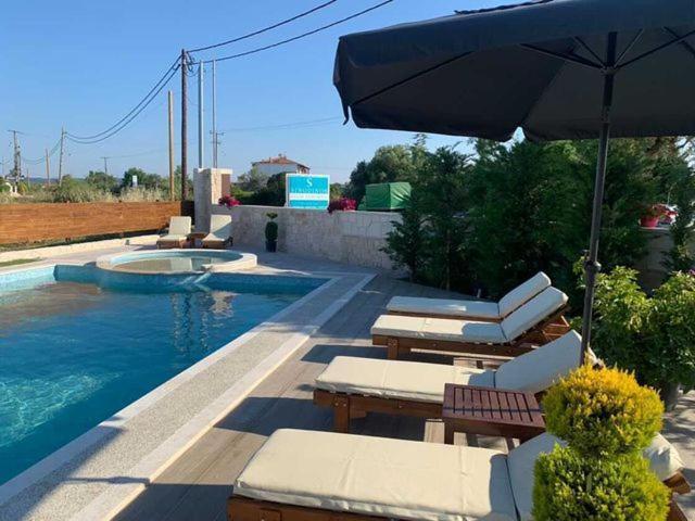 Sinodinos Deluxe Apartments Афитос Экстерьер фото