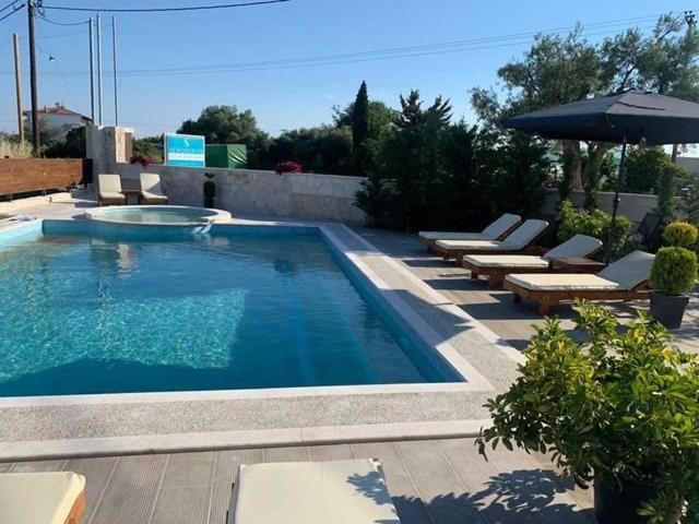 Sinodinos Deluxe Apartments Афитос Экстерьер фото