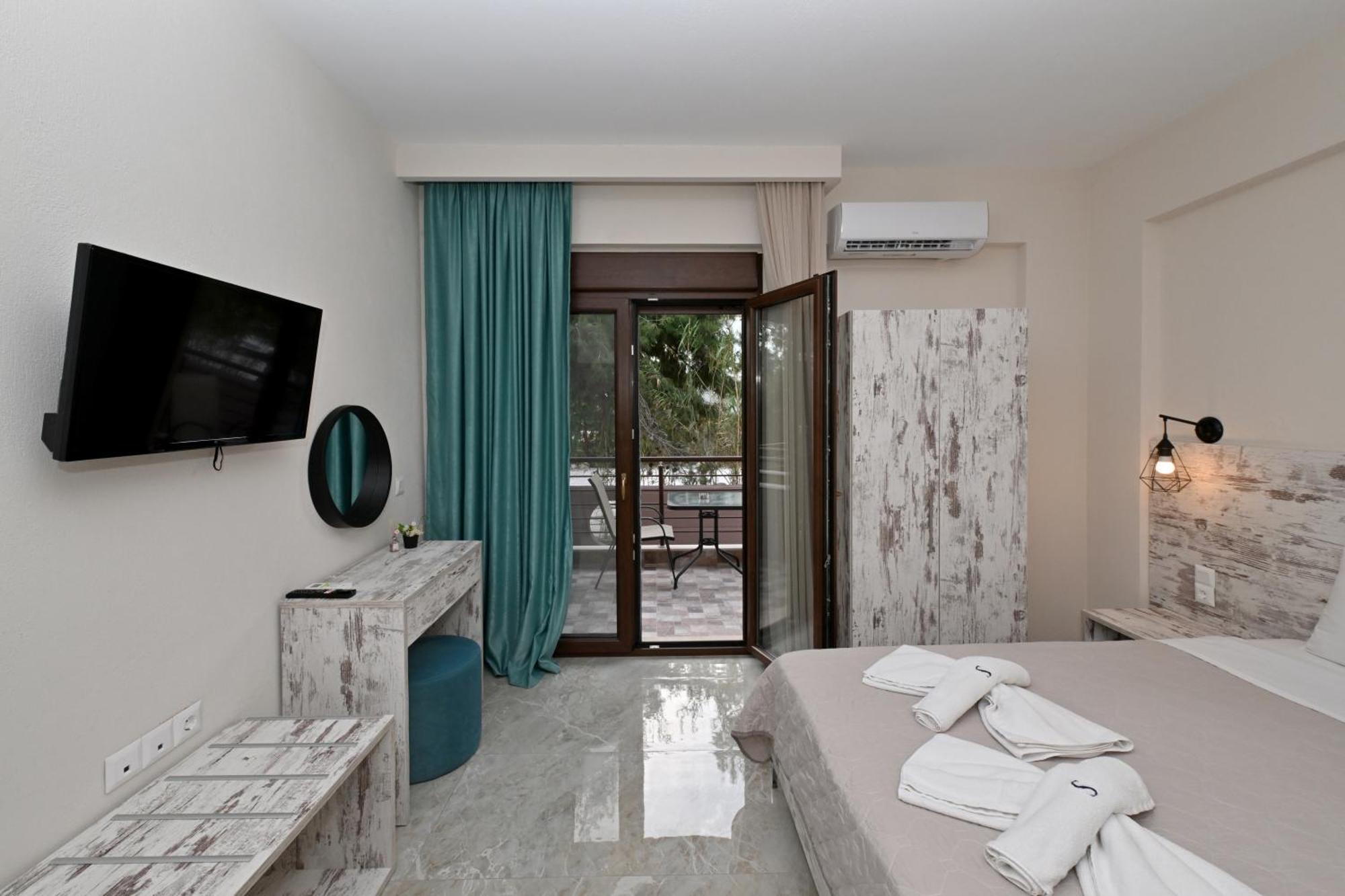 Sinodinos Deluxe Apartments Афитос Экстерьер фото